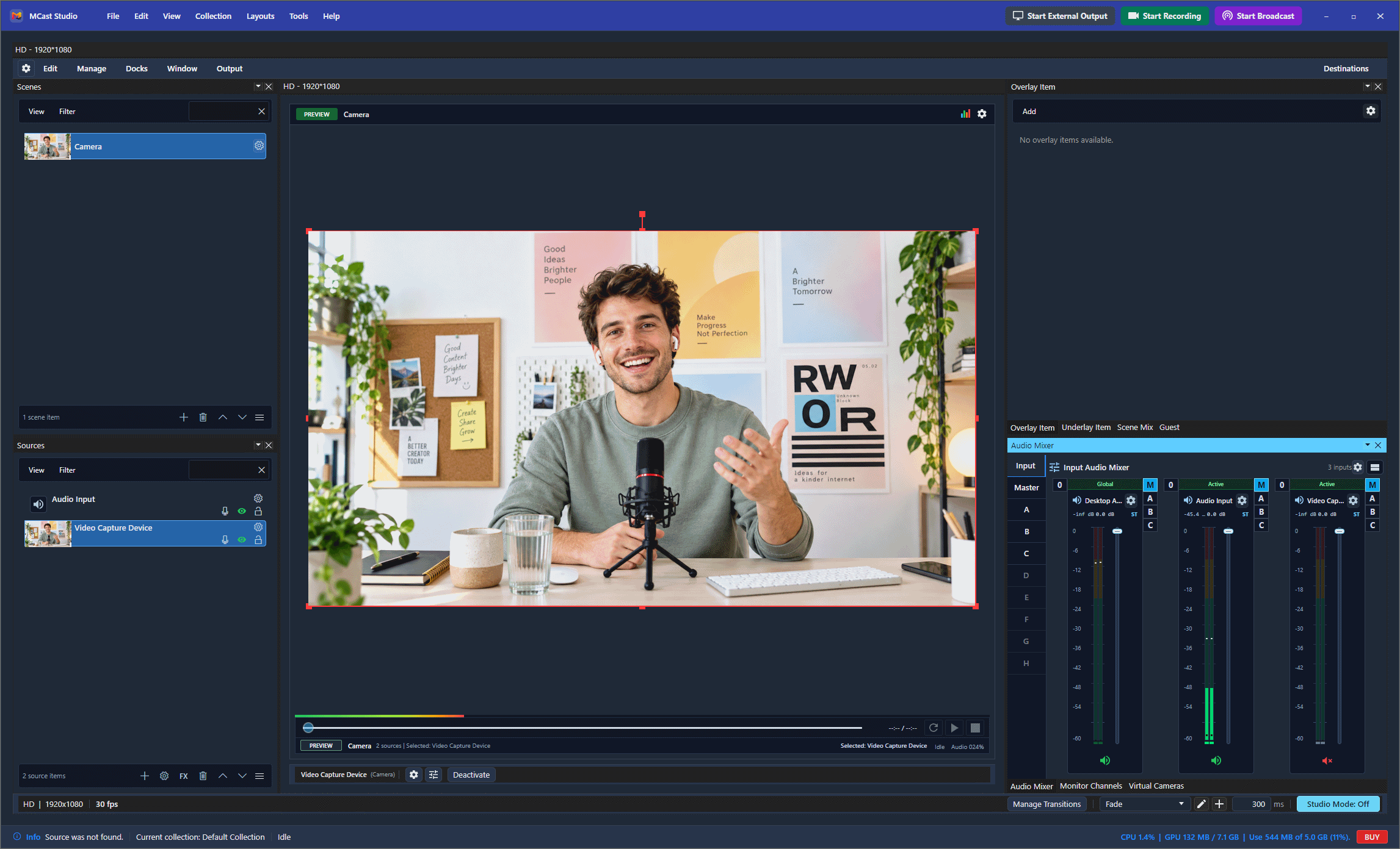 MCast Studio workspace showing a camera preview, scenes, sources, and audio mixer